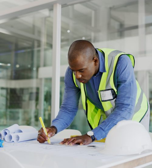 Serious architecture man drawing blueprint lines with design process, planning development and builder project tools. Floor plan construction and focus of engineer black person or business contractor